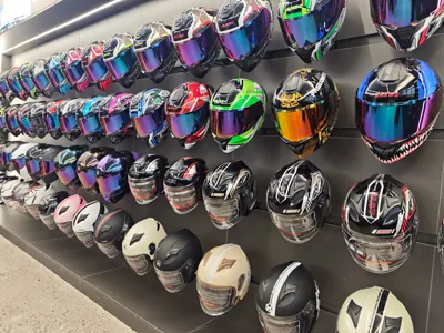 Precision spraying production line for custom helmet painting